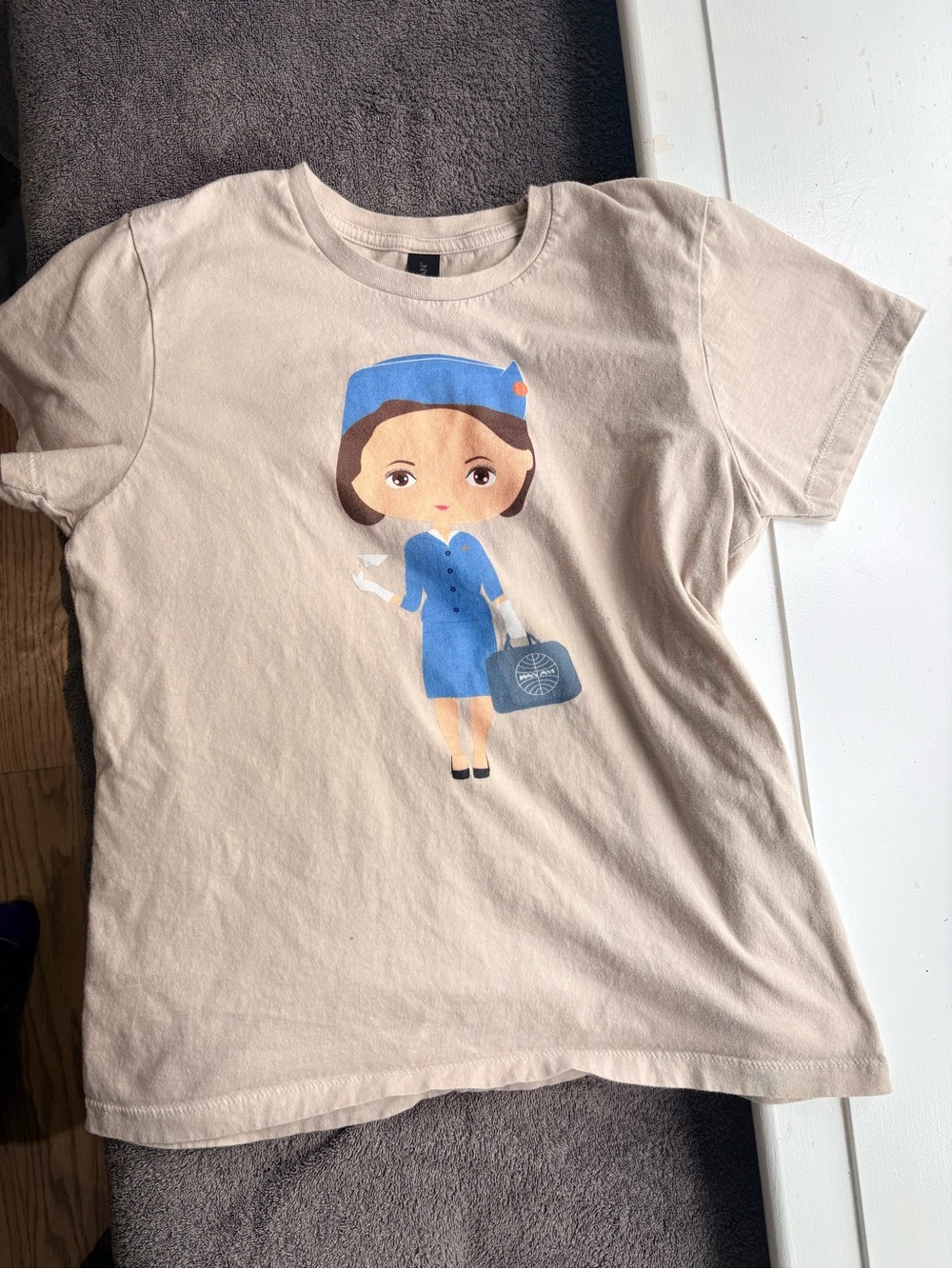 Women’s Beige Tee with Pan Am Flight Attendant Graphic